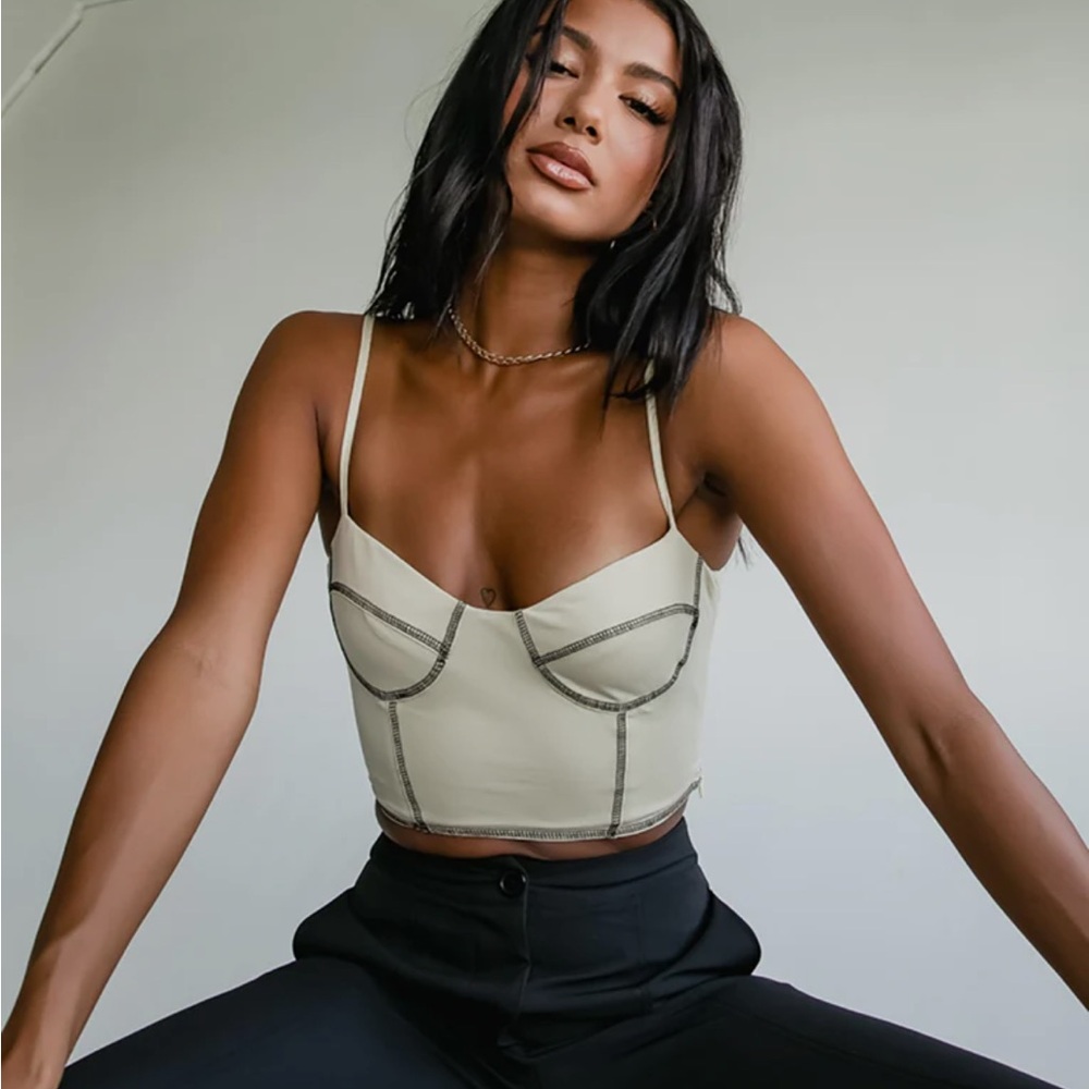 Princess Polly tan crop top with black seems outlining